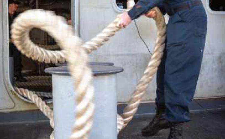 Rossford native heaves a line on fantail aboard USS Nimitz