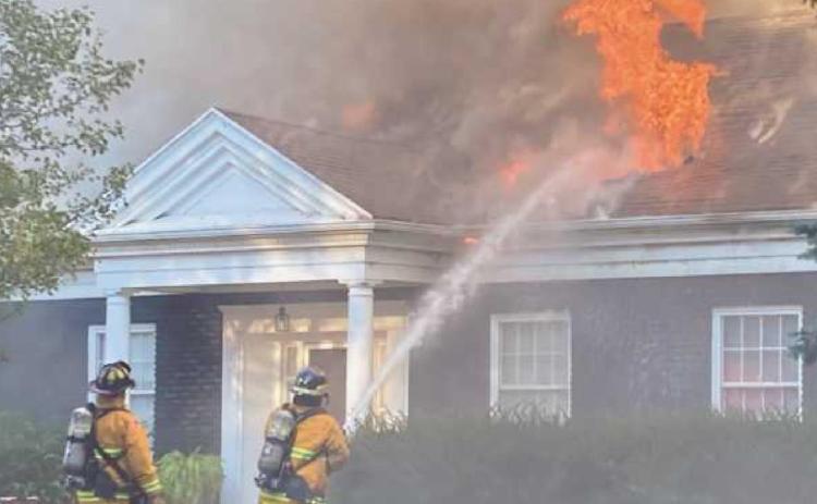 Secor Woods house fire starts in garage
