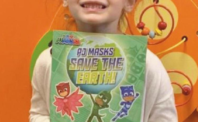 Christina Cooper completes libraryʼs reading challenge