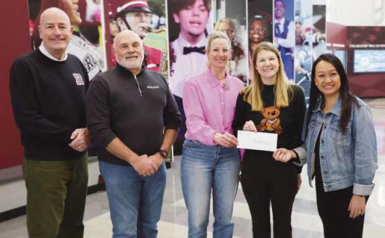 From left: Superintendent Dan Creps, foundation Vice President Doug Miller, teachers Ann Trondson and Kelly Burnett and foundation President Mary Shinavar.