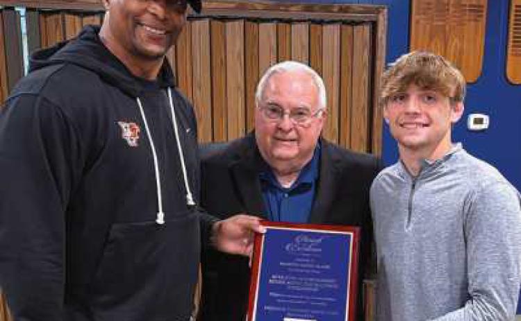From left: Coach Eddie George, Freedom Township Men’s Club Representative Rick LaLonde and Marcus Blaze.