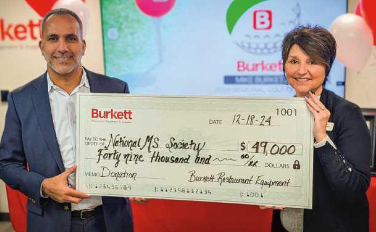 Jameel Burkett (Burkett Restaurant Equipment and Supplies president and CEO) and Julie Leggett (Ohio chapter president of the National MS Society)