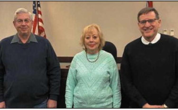 Oath of office administered on February 6 at Wood County Juvenile Court (from left): CRB volunteers Steve Heckler and Ann Hannah-Cizauskas with Judge David Woessner.