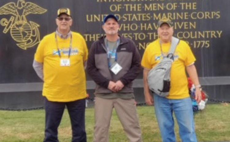 Rossford residents, Vietnam war veterans and retired members of the Rossford Police Department were recently recognized for their service by the non-profit organization, Honor Flight Network. Pictured from left are veterans Ronald Parrish and Michael Reiter, RPD Chief Todd Kitzler, at center, served as their guardian on the trip.
