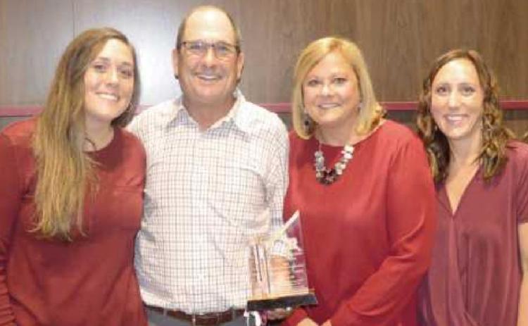 Mr. Swartz, RHS Class of 1979, received his award accompanied by his wife, Sue, also Class of 1979, and daughters, Amanda, Class of 2004, and Katie, Class of 2006.