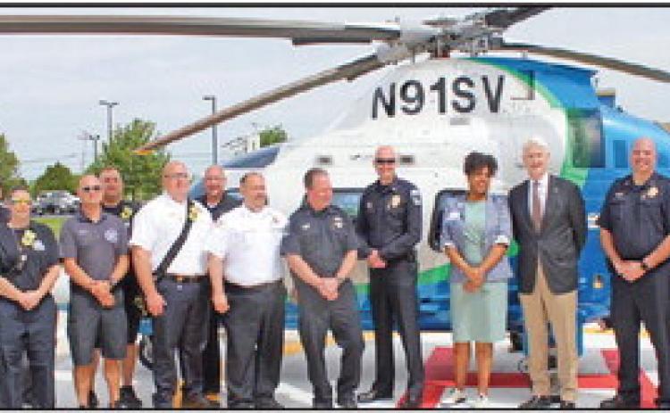 Law enforcement and first responders from Perrysburg, Wood County and the surrounding area join with officials from Mercy Hospital Perrysburg to remind residents of the importance of buckling up, whether as a driver or passenger.