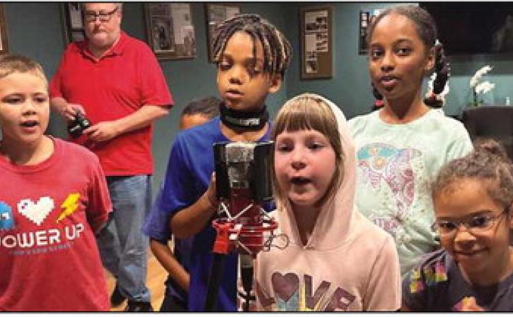 Students learned about the music business, creating an album cover and recording a song in the Center of Hope’s studio.