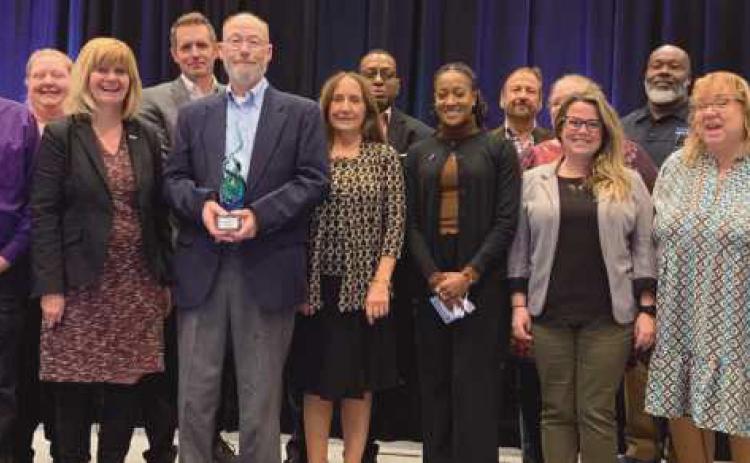 Don Glaza, third from left in the front row, with TARTA personnel at the Ohio Public Transit Association convention.