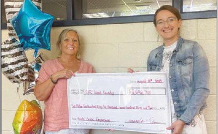 Pictured from left, Melanie Vandyne, executive director of the CRC and Amanda Kern, executive director of the WCADAMHS board.