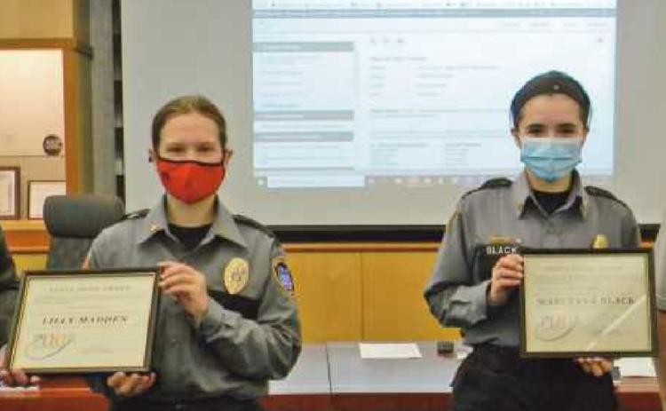 Criminal justice and firefighter students received Penta Pride awards for their professional and outstanding volunteer assistance during the two COVID-19 vaccination clinics at Penta February 19 and March 12. Accepting their awards were Lilly Madden of Rossford, second from left, and Marceana Black of Maumee, seniors in the criminal justice program with Superintendent Ed Ewers, left, and board president Kenneth Sutter.