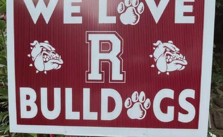 Yard sign sales support RHS cheerleading