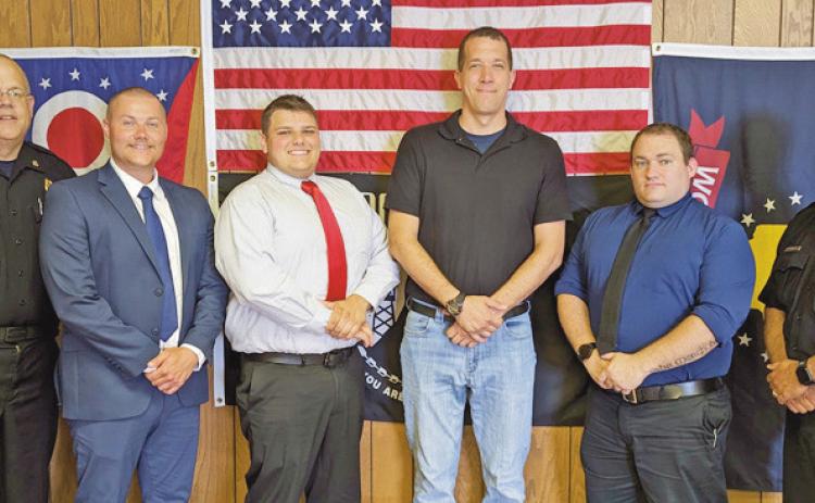 Four firefighters were hired to work for the fire department beginning June 23. From left are Fire Chief Tom Brice, new firefighters Ryan Shaffer, Sam Eiben, Jacob Cook and Alva Conger, and Deputy Chief Jim Rodriguez.