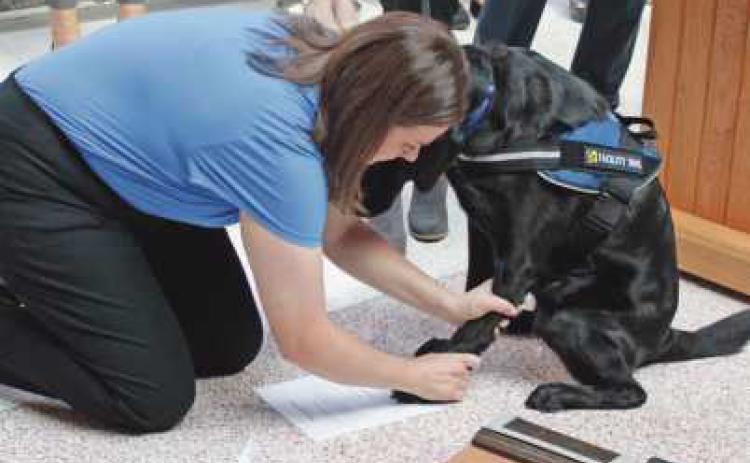Wood County sheriff deputizes newest addition to courtroom staff