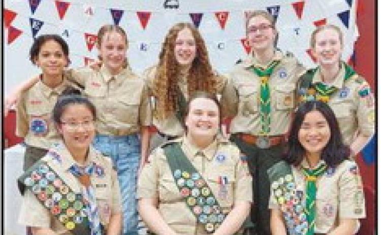 Troop 9197, front row: Meg Bode, Grace Eckel and Kate Bode. Back: Keyaira Huggins-Chandler, Emily Sturtz, Lily Sturtz, Beth Adkins and Lila Smith.