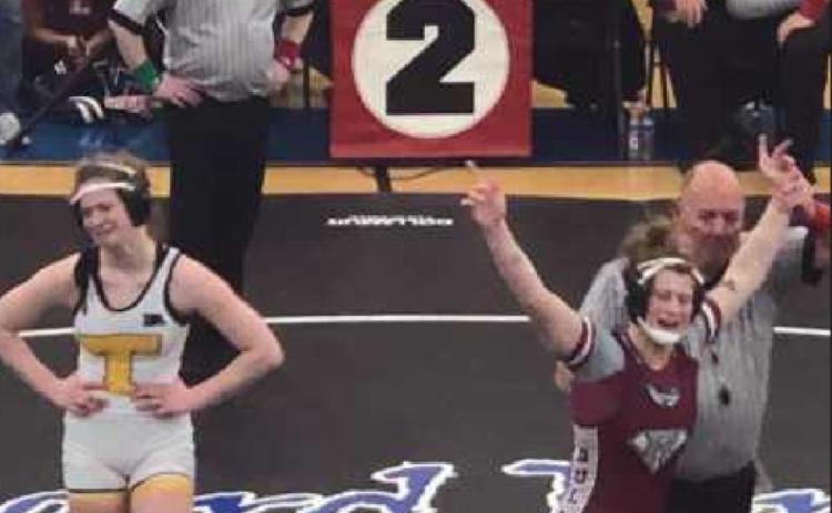 RHS senior Zoe Hussar takes the victory in the girls wrestling state championship.