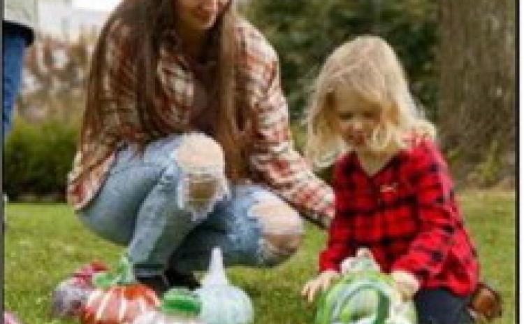 Museum visitors of all ages marvel at handblown glass pumpkins created by TMA studio artists during the museum’s annual Glass Harvest, Sept. 27-28. The pumpkins are available for sale.
