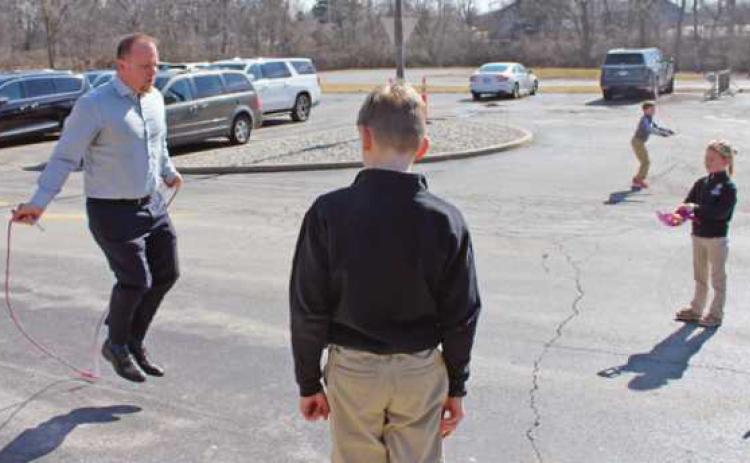 New All Saints Catholic School Principal, Erik Graham, jumps into action